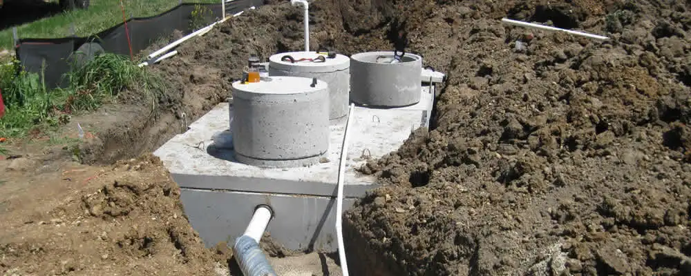 Septic system repair and installation site with tank access ports in Nashville, TN