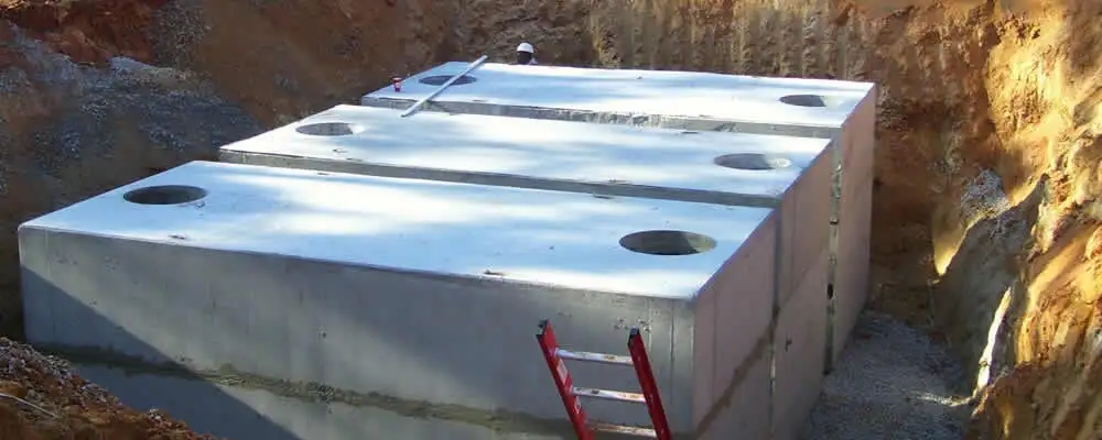 Septic tank installation site with a newly placed concrete tank in Nashville, TN